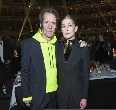 Atom Uniacke's parents, Robie Uniacke and Rosamund Pike, in an award function.